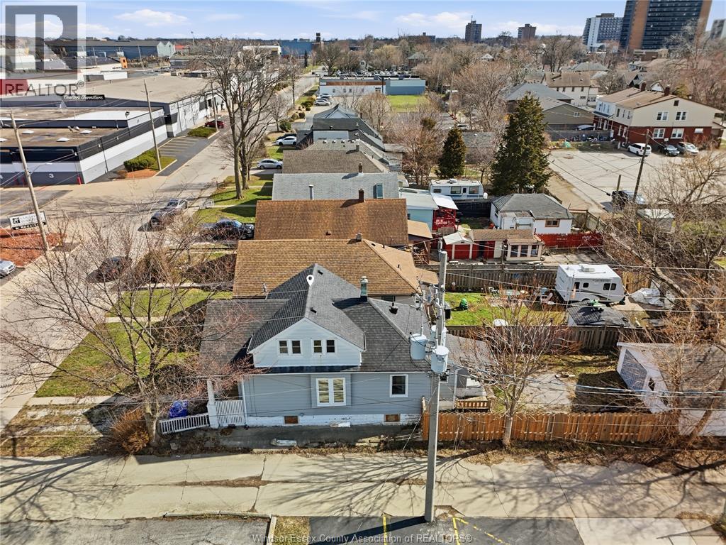 A residential area with houses and apartment buildings.