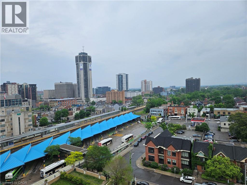A cityscape with a bridge and buildings.