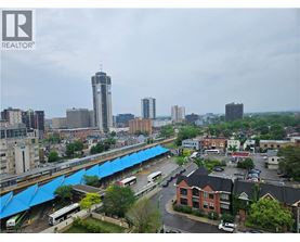 A cityscape with a bridge and buildings.