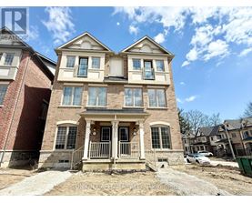 A house with a brick facade and a large front porch is for sale.