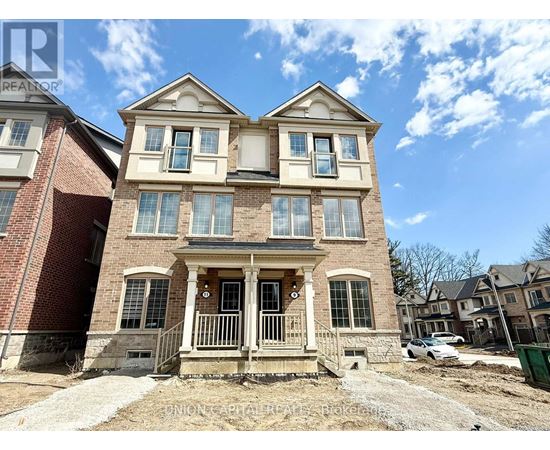 A house with a brick facade and a large front porch is for sale.