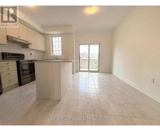 A kitchen with a stove top oven and a microwave.