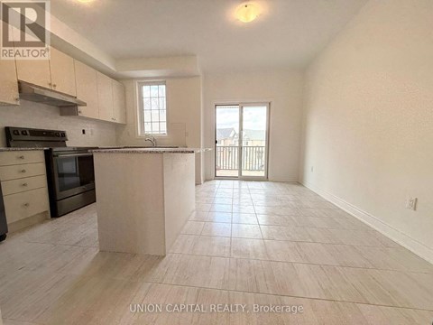 A kitchen with a stove top oven and a microwave.