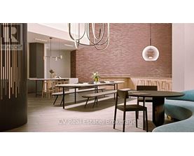 A modern dining room with a table set for four.