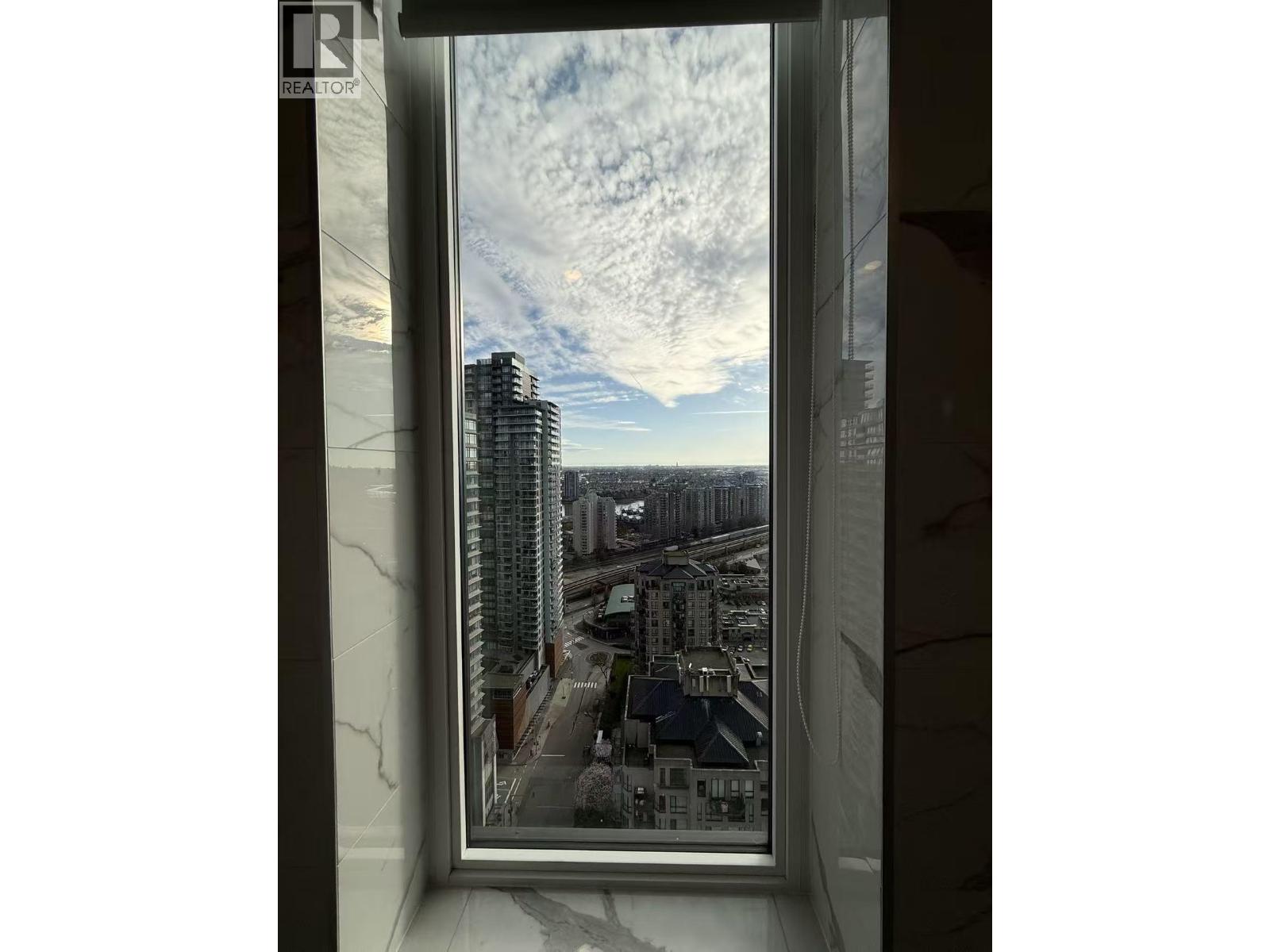 A view of a cityscape from a high-rise building.