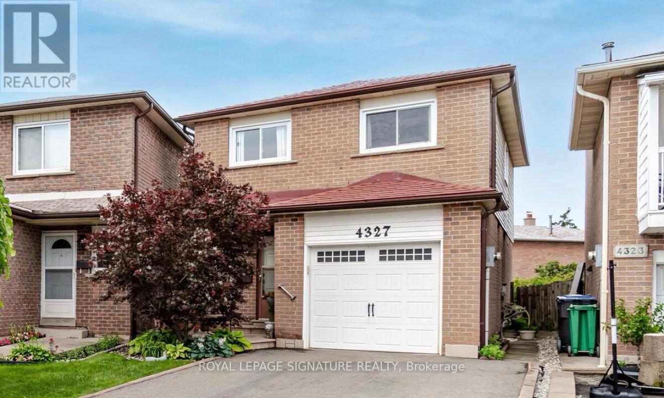 A house with the number 4327 on it is for sale.