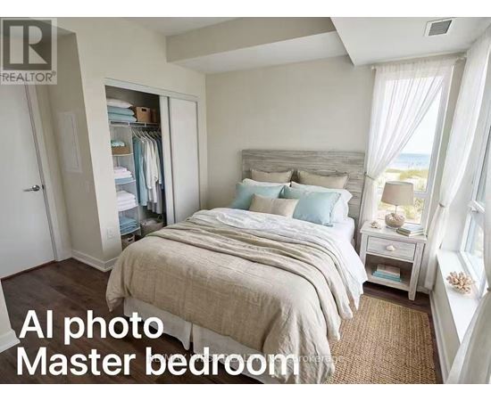 A bedroom with a large bed and a window with curtains.