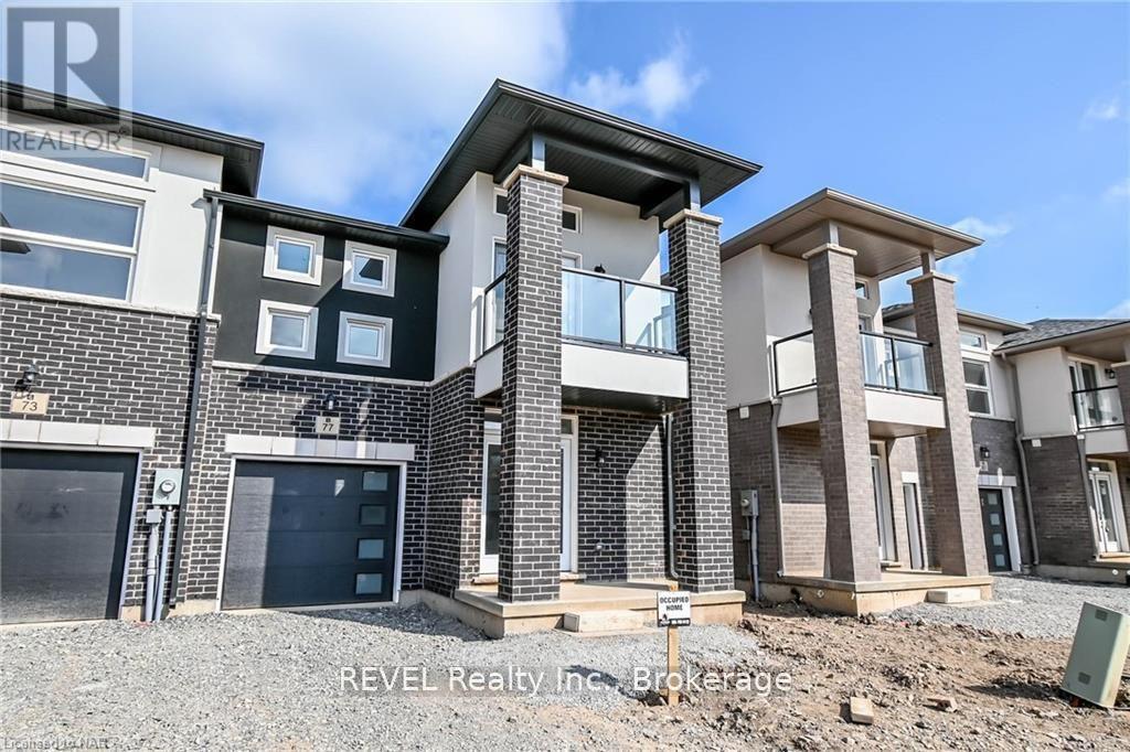 A modern house with a balcony is for sale by REVEL Realty Inc.