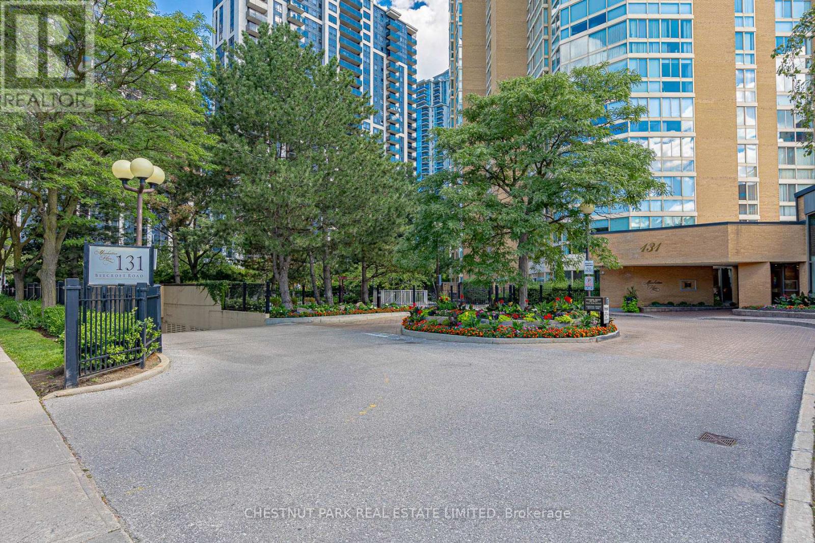 A Chestnut Park Real Estate Limited brokerage sign is in front of a building.