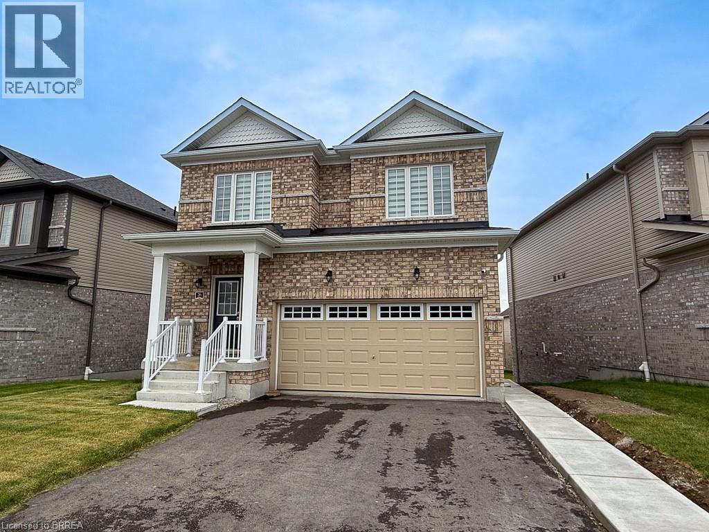 A house with a garage is for sale.