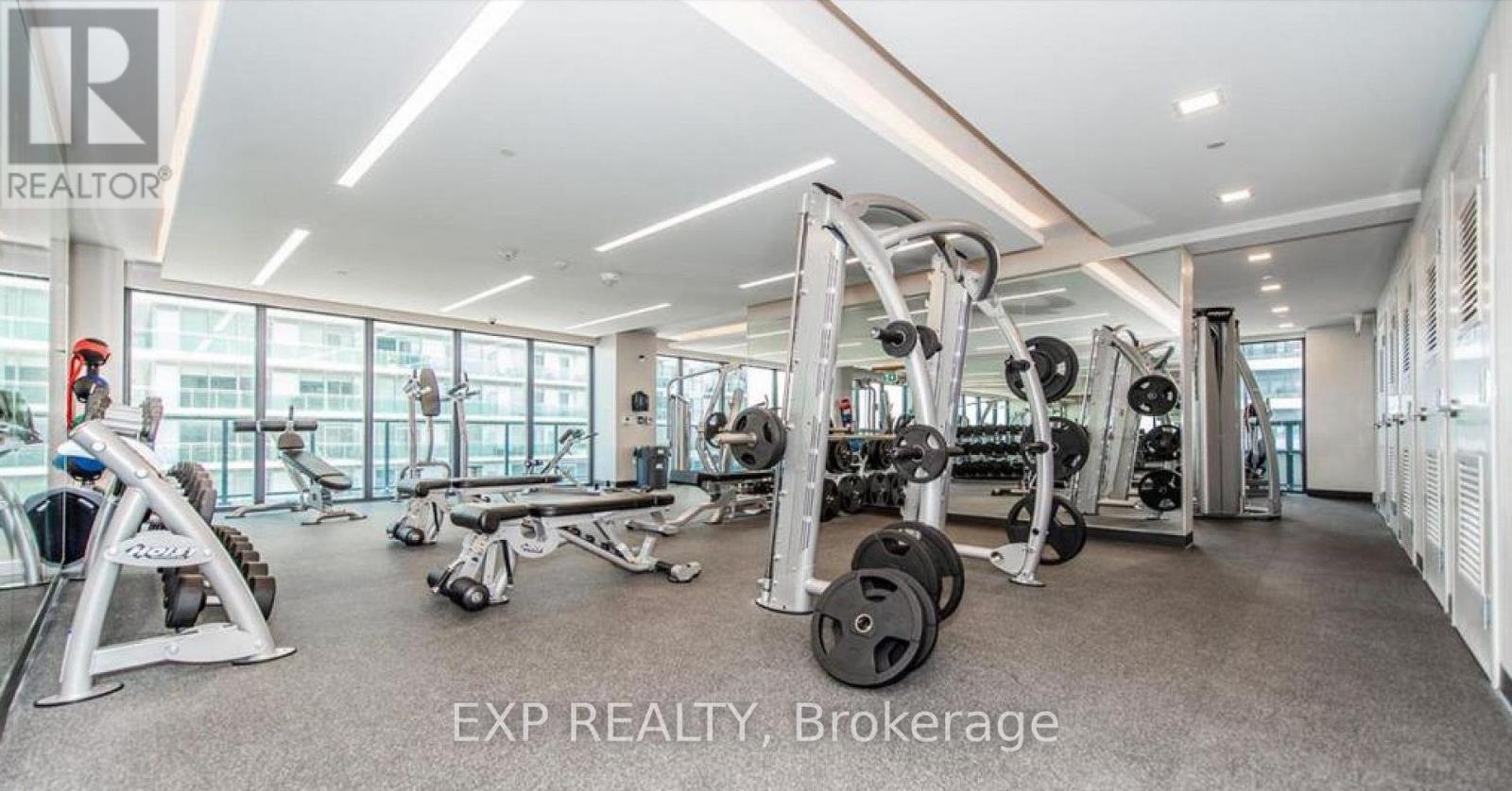 A gym with a variety of equipment is available for use.