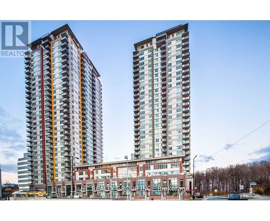Two tall residential buildings stand next to a building with a glass facade.