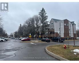 A street view of a residential area with cars parked on the side of the road.