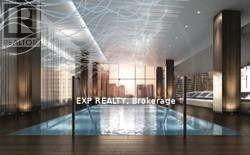 A modern interior space with a pool and the words EXP REALTY Brokerage.