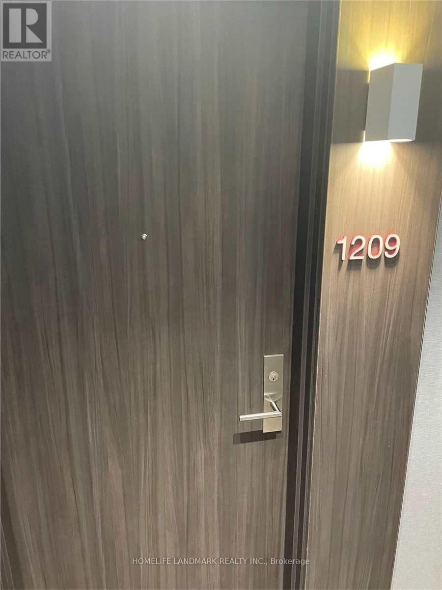 A door with the number 1209 on it.