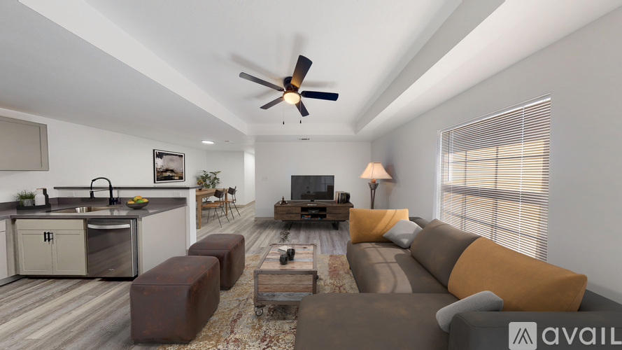 A modern living room with a brown and beige color scheme.