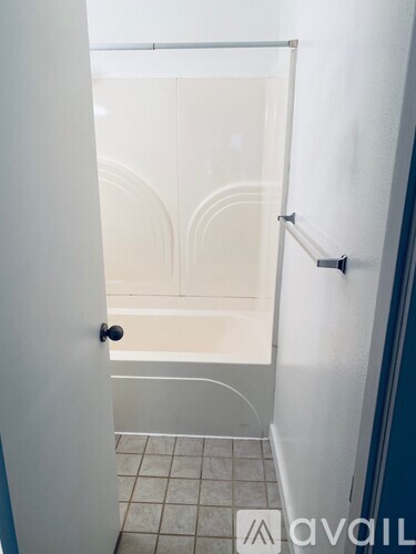 A bathroom with a walk-in shower and a toilet.