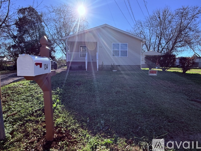 A house with a mailbox in front of it.