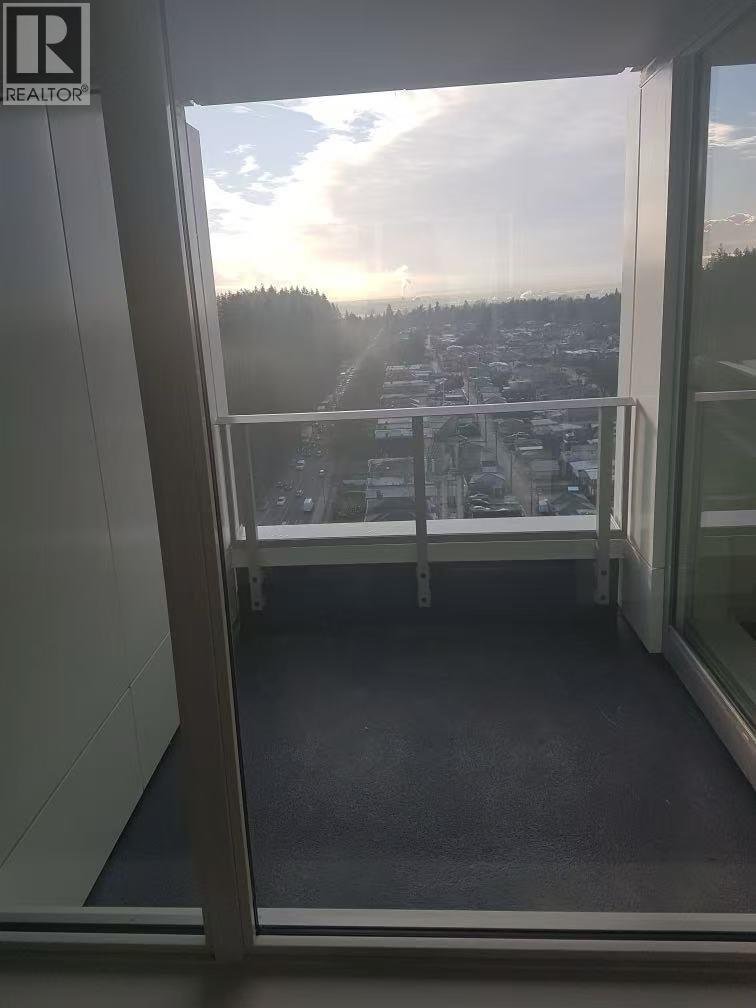 A balcony with a view of a cityscape.