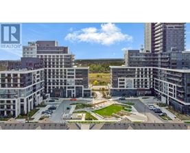 A realtor brokerage office is located in a large, modern building complex.
