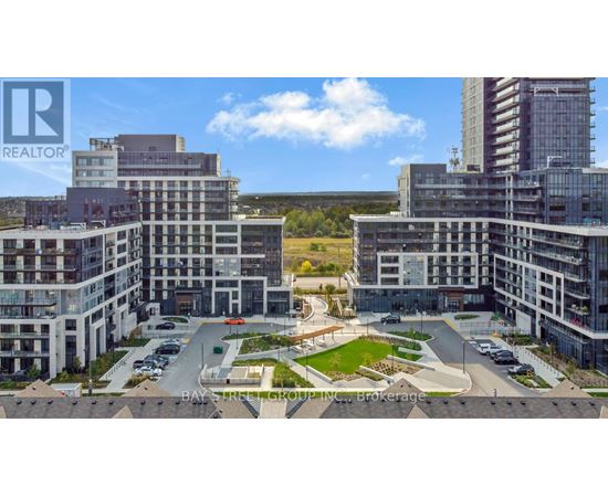 A realtor brokerage office is located in a large, modern building complex.