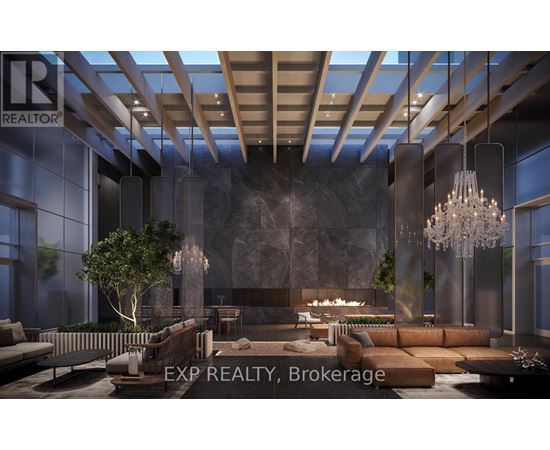 A modern living room with a large sofa set and a chandelier.