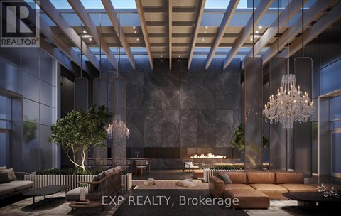 A modern living room with a large sofa set and a chandelier.