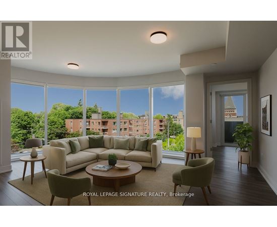 A living room with a large couch and a view of the city.
