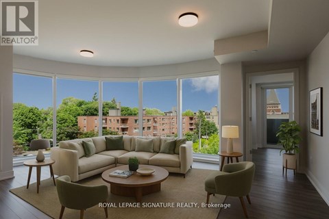 A living room with a large couch and a view of the city.