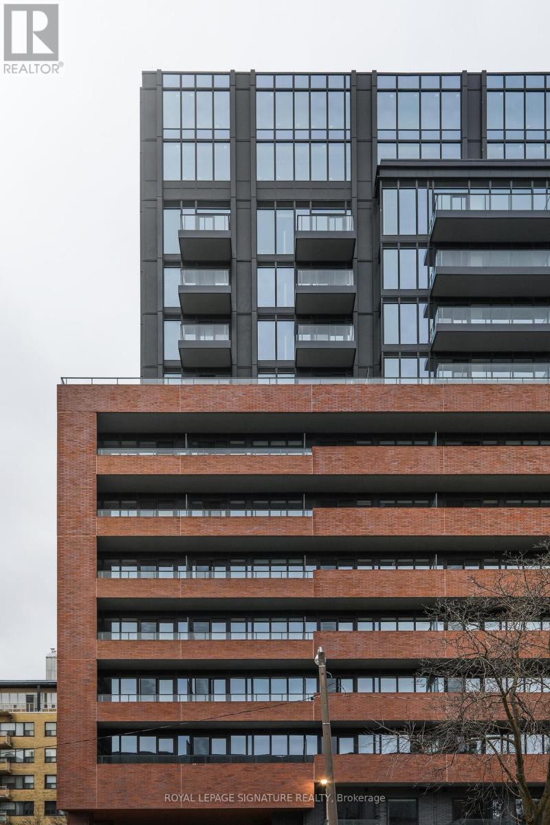A tall building with a sign that says "Royal LePage Signature Real Estate Brokerage".