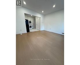 A room with a washer and dryer in it.