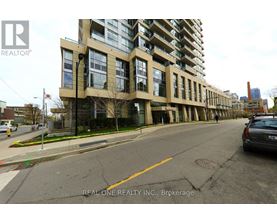 A street view of a building with the logo REAL ONE REALTY INC., Brokerage on the bottom right.