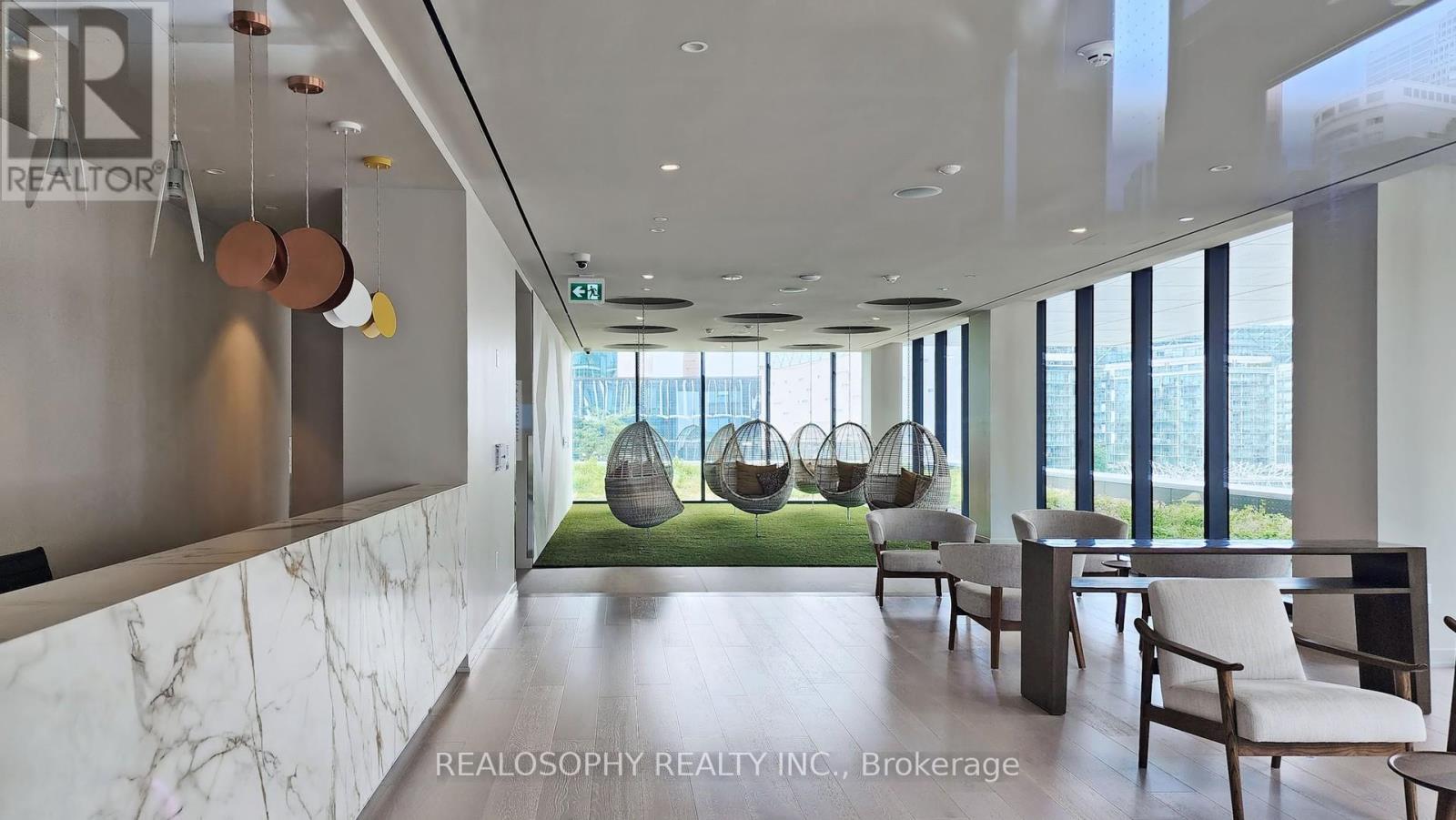 A modern office space with a view of the outdoors.
