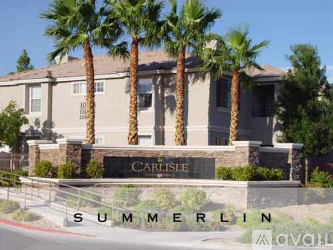 A building with a sign that says Carlisle in front of it.