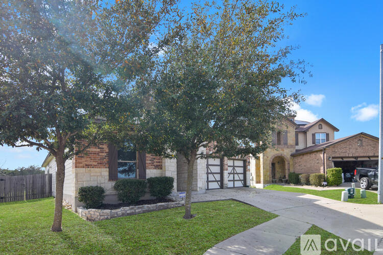 A house with a garage and a driveway.