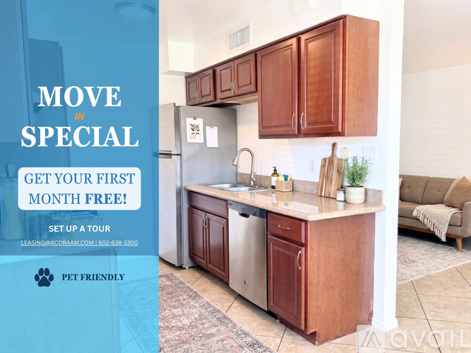 A kitchen with wooden cabinets and a sign offering a free first month of rent.