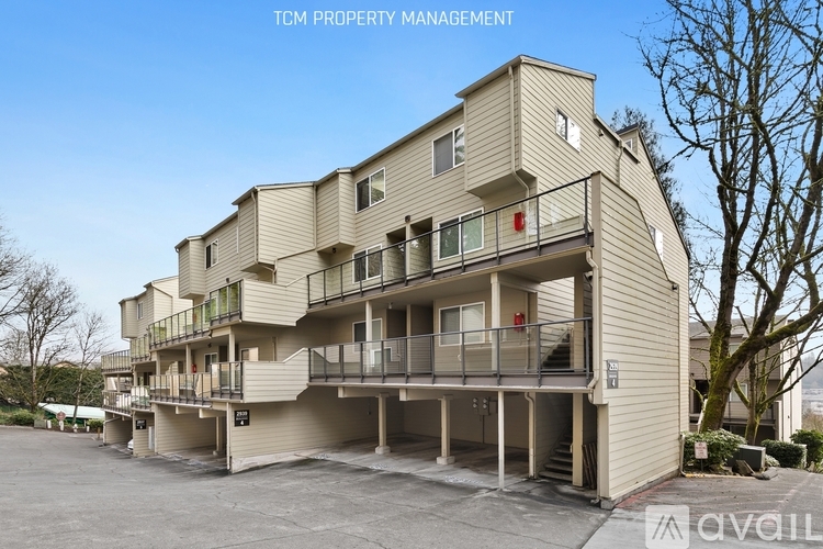 A building with the text "TM PROPERTY MANAGEMENT" on the top left corner.