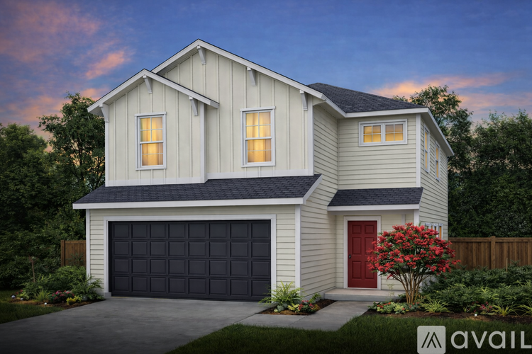 A house with a red door and a garage door is available for sale.