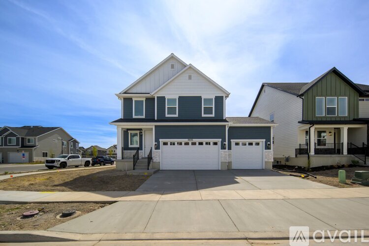 A house with a garage is available for sale.