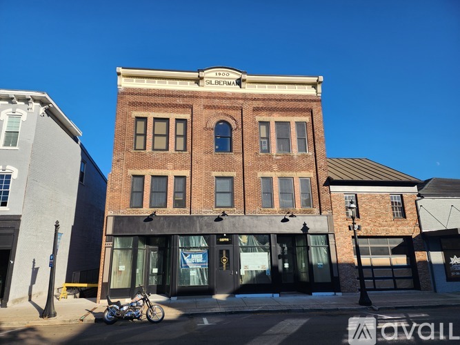 A building with a sign that says "Subway" on it.