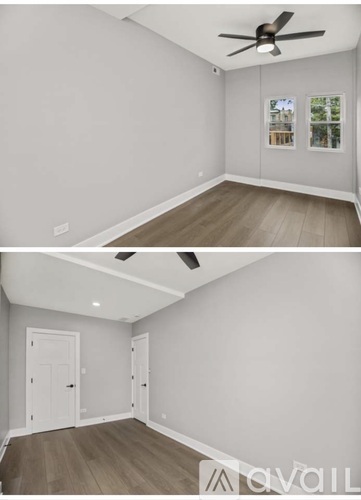 A room with a ceiling fan and a door.