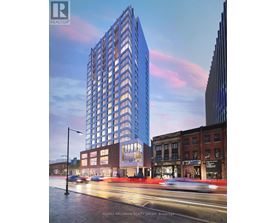 A tall blue building with a glass facade is the focal point of the image.