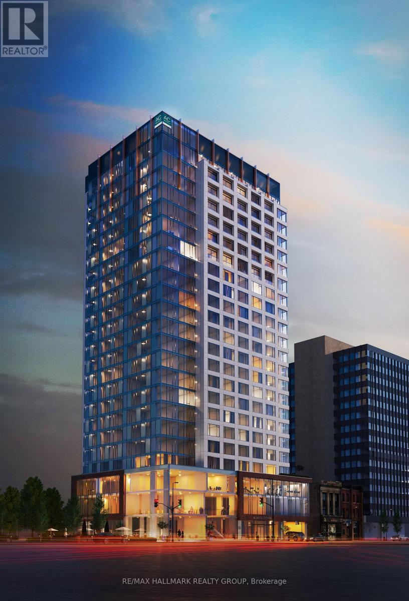 A tall building with a glass facade is the main focus of the image.