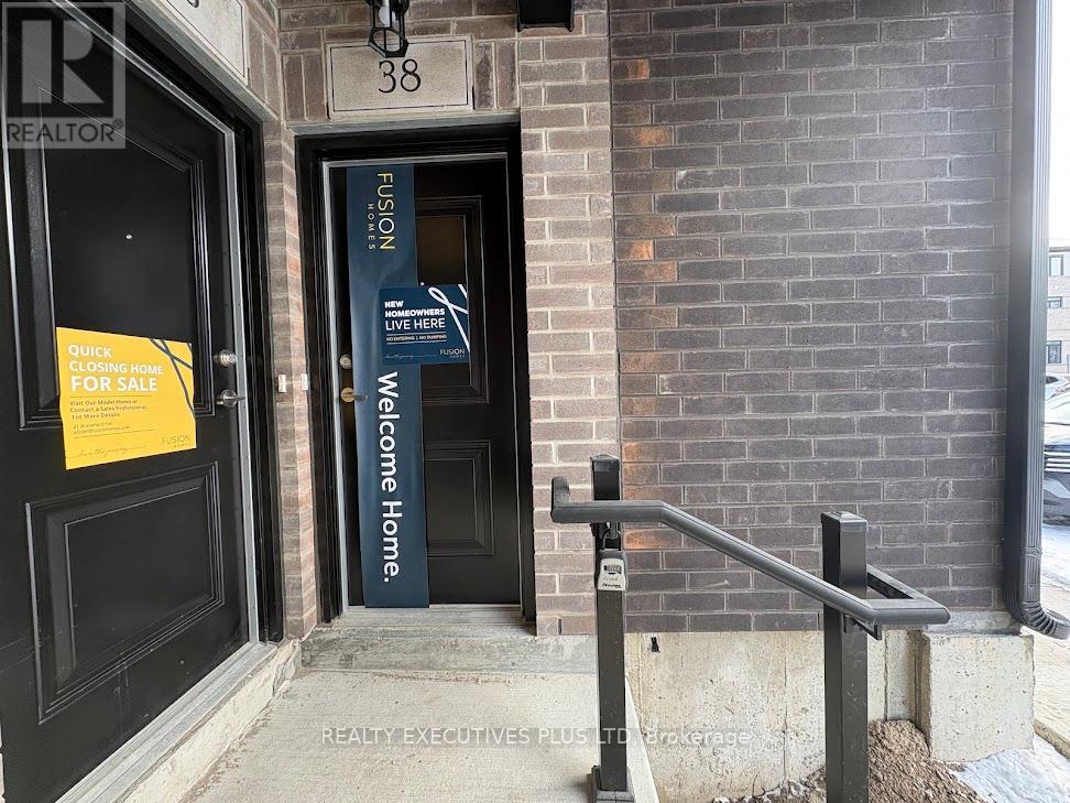 A sign on a door reads "Welcome Home.".