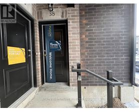 A sign on a door reads "Welcome Home.".