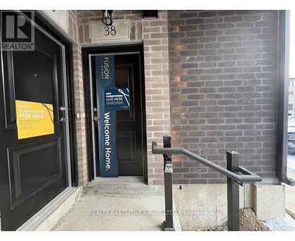A sign on a door reads "Welcome Home.".