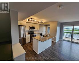 A modern kitchen with a large island in the middle.