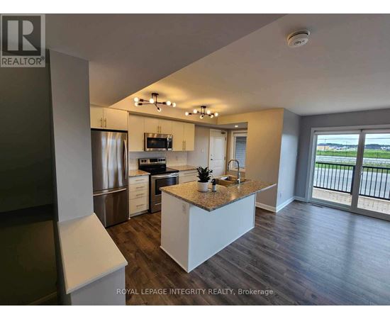 A modern kitchen with a large island in the middle.