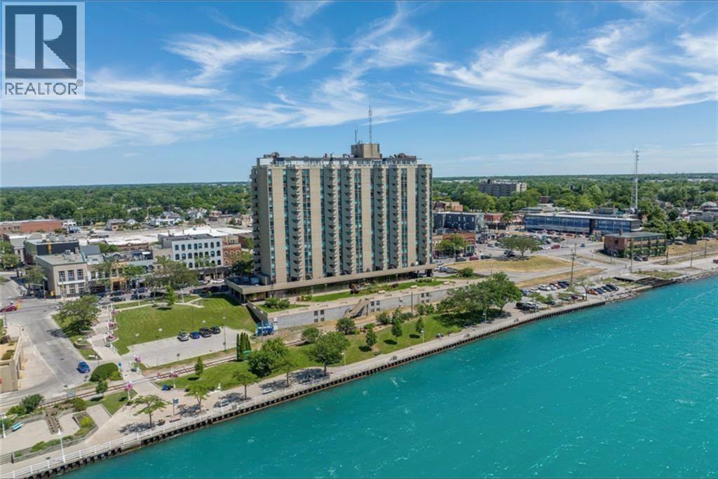 A large building with a sign that says REALTOR in the corner.