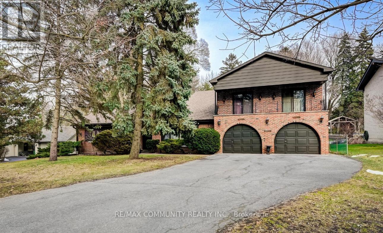 A house with a driveway in front of it.